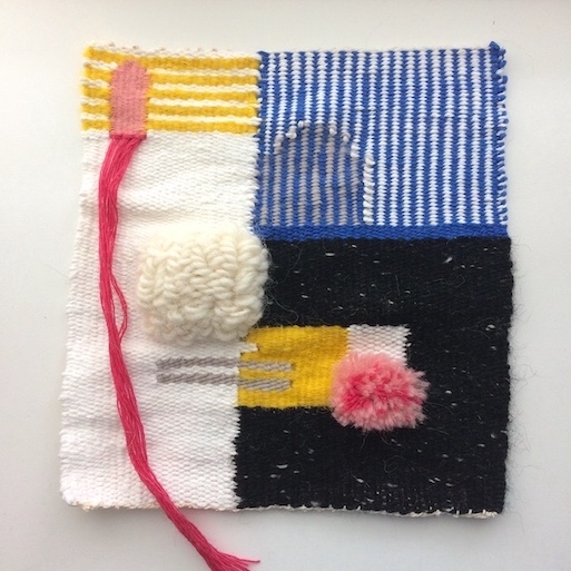 Square weaving featuring horizontal and vertical stripes and geometric shapes. In black, white, yellow, blue, gray and pink.