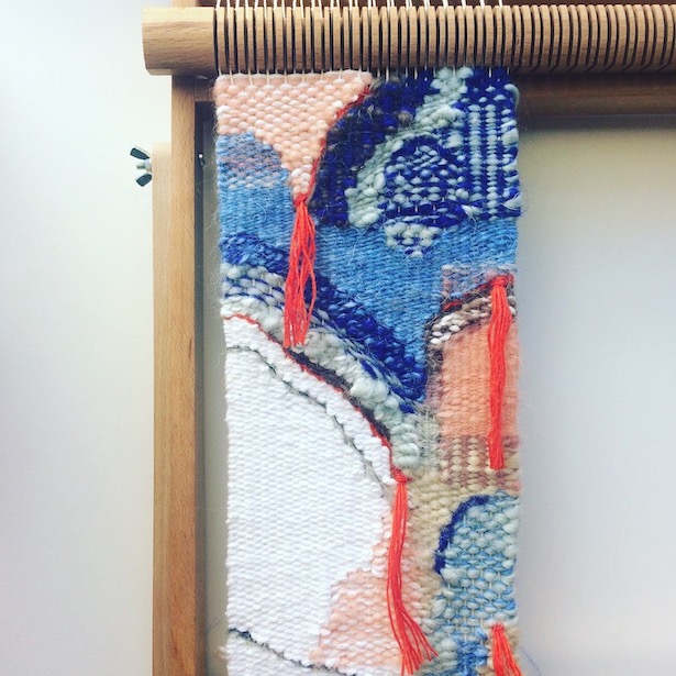 Rectangular weaving resembling a coral reef. In blues, seafoam, blush, white, orange, beige, gray, and browns.